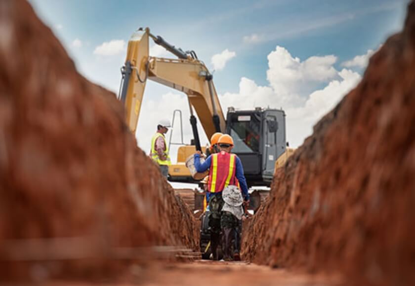 What tools do I need to lay drainage pipe?